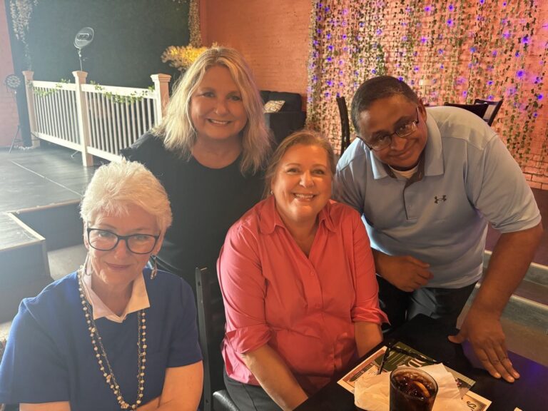 One Degree Dalton members networking at an evening event in downtown Dalton, Georgia